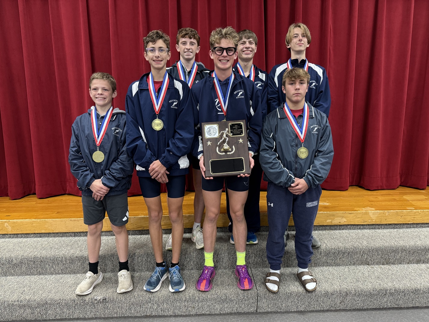 Boys cross country team poses for a photo.